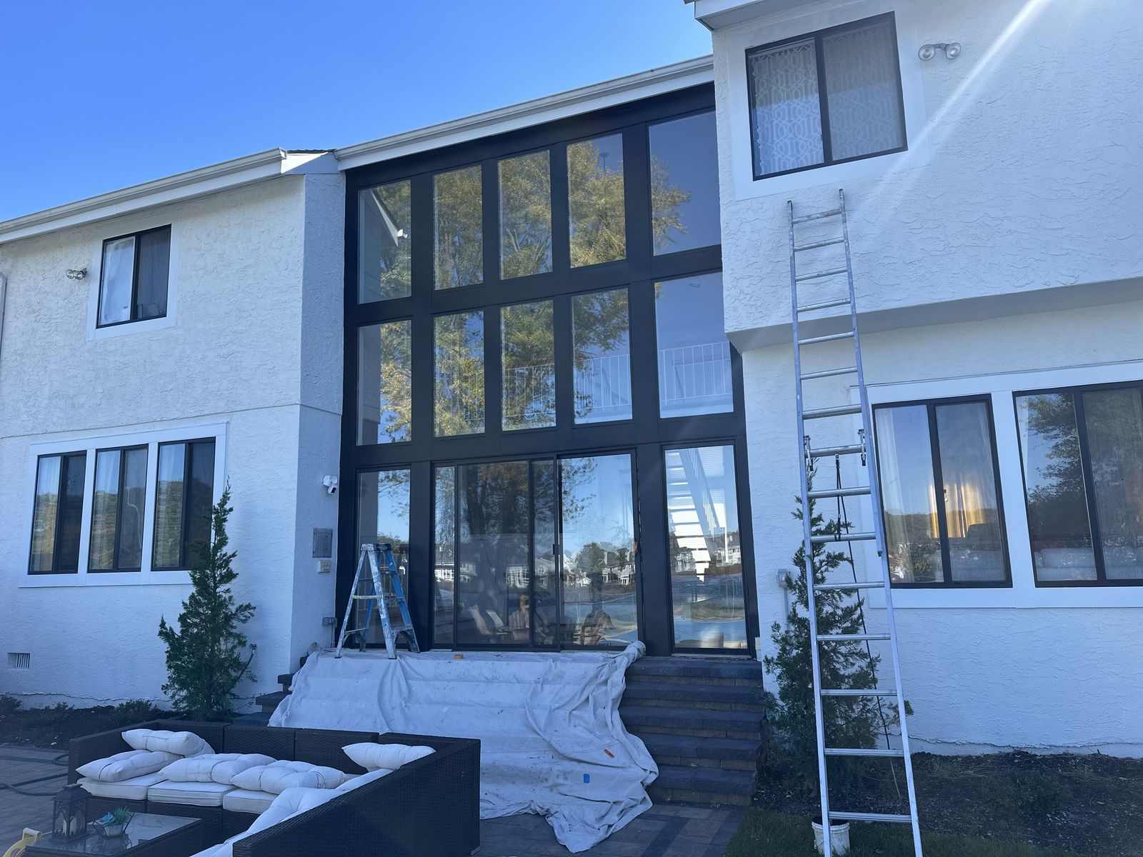 Before and after exterior house painting on a home in Voorhees, NJ by HRF Painting & Construction.
