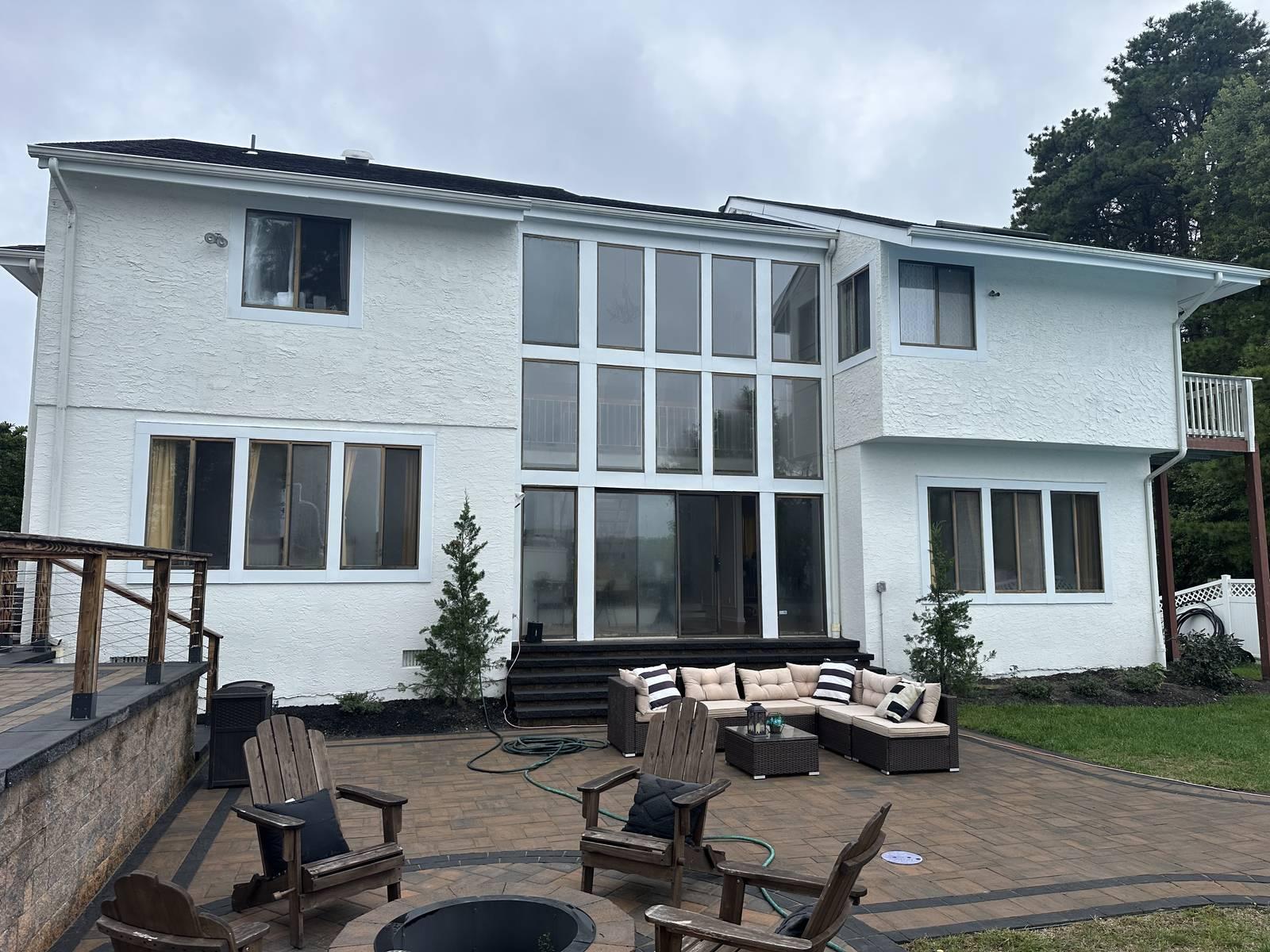 Before and after exterior house painting on a home in Voorhees, NJ by HRF Painting & Construction.
